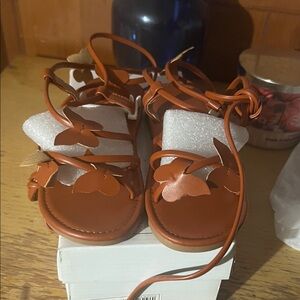 Kids Brown Sandals with Butterfly Design
Never wore